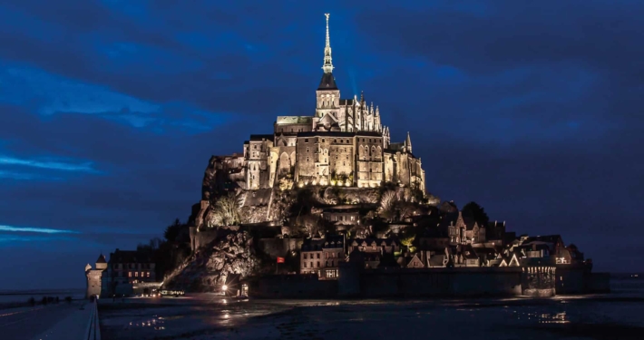 Mont Saint Michael rises from the water forming one of the best islands to visit at high tide