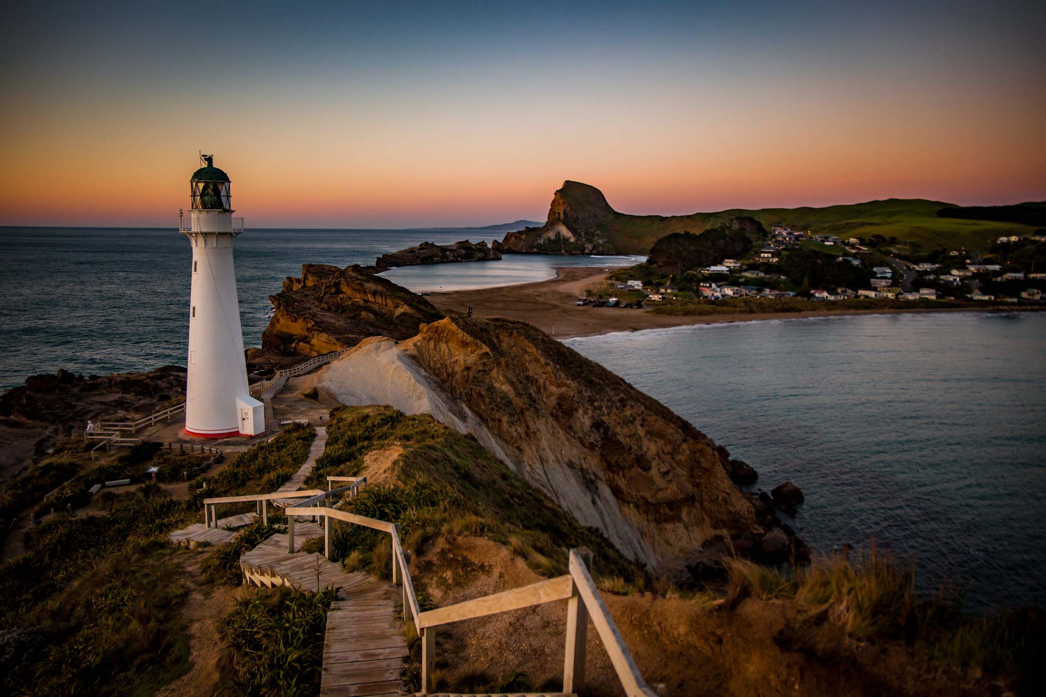 The Castlepoint lighthouse at sunrise, New Zealand