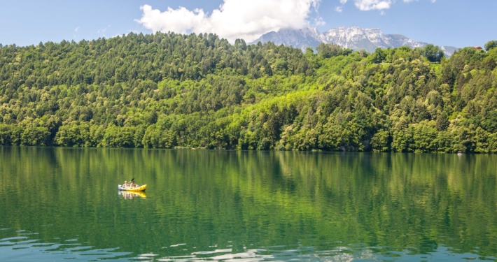 A yellow Kayak on Lake Levico in Valsugana