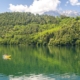 A yellow Kayak on Lake Levico in Valsugana