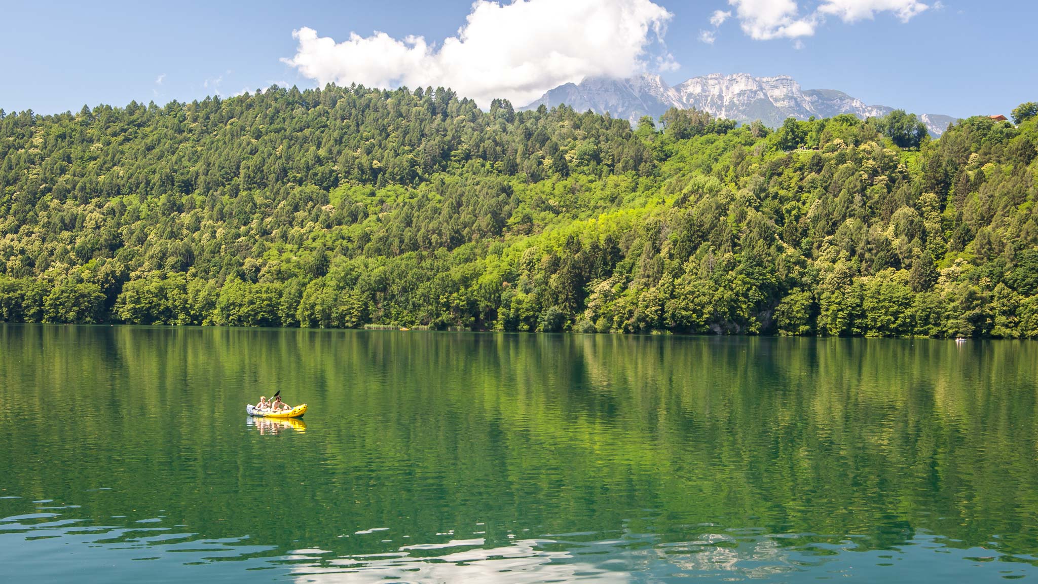 A yellow Kayak on Lake Levico in Valsugana