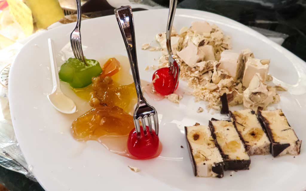 a metropolis of classic violins, mustard fruit and surprises a metropolis of classic violins, mustard fruit and surprises