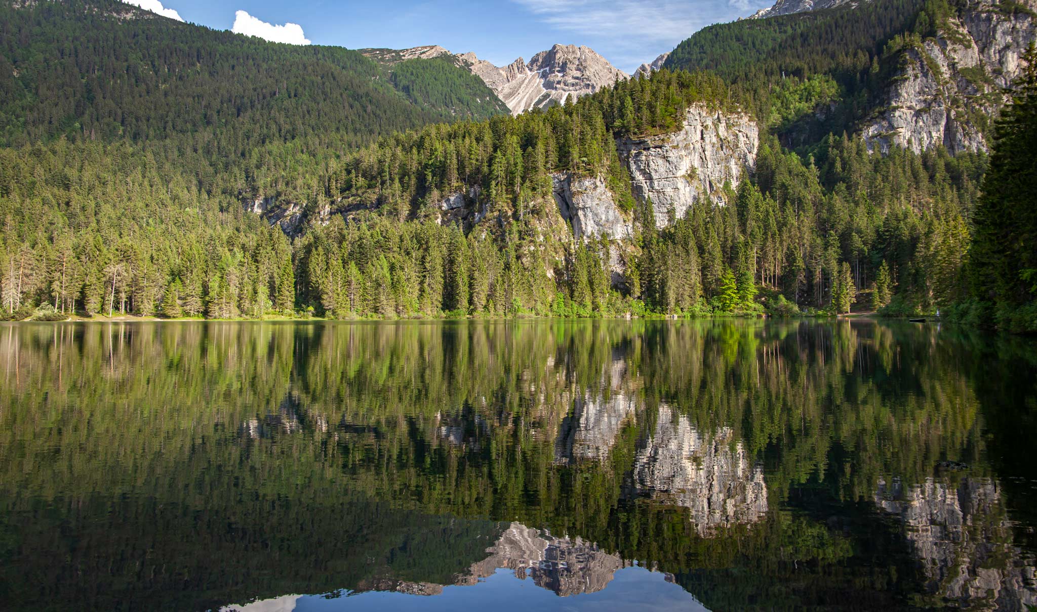 Beautiful alpine reflections at Lake Tovel