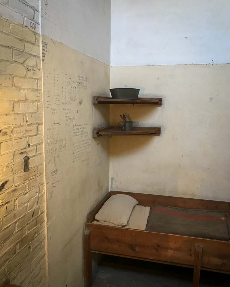 A cell room inside the Hague prison and national monument