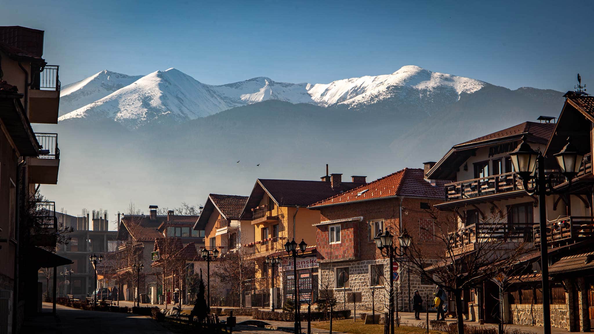 The view of old town Bansko and the snowy mountains