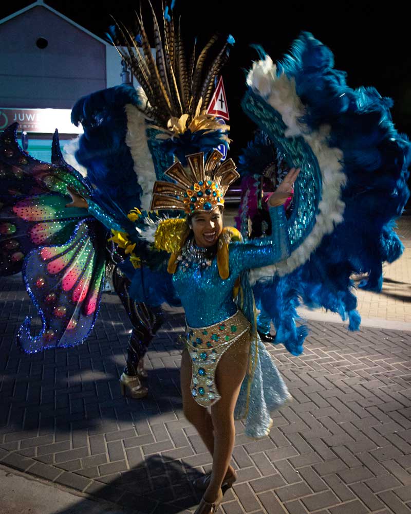 Traditional and colourful carnival outfit worn during a dance along the street in San Nicolas