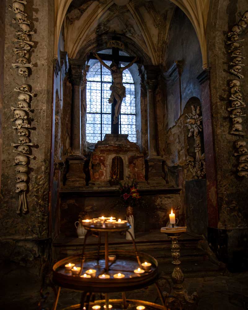 Candles light up an underground chapel