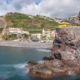 The village of Ponto do Sol in Madeira, with green hills and a small bay for swimming