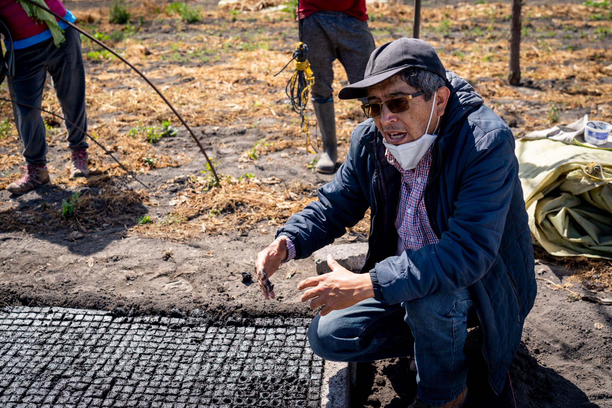 David, a chinampero, guides us through the farming method