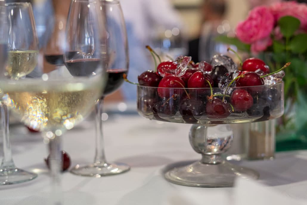 Cherries sit on every table in June