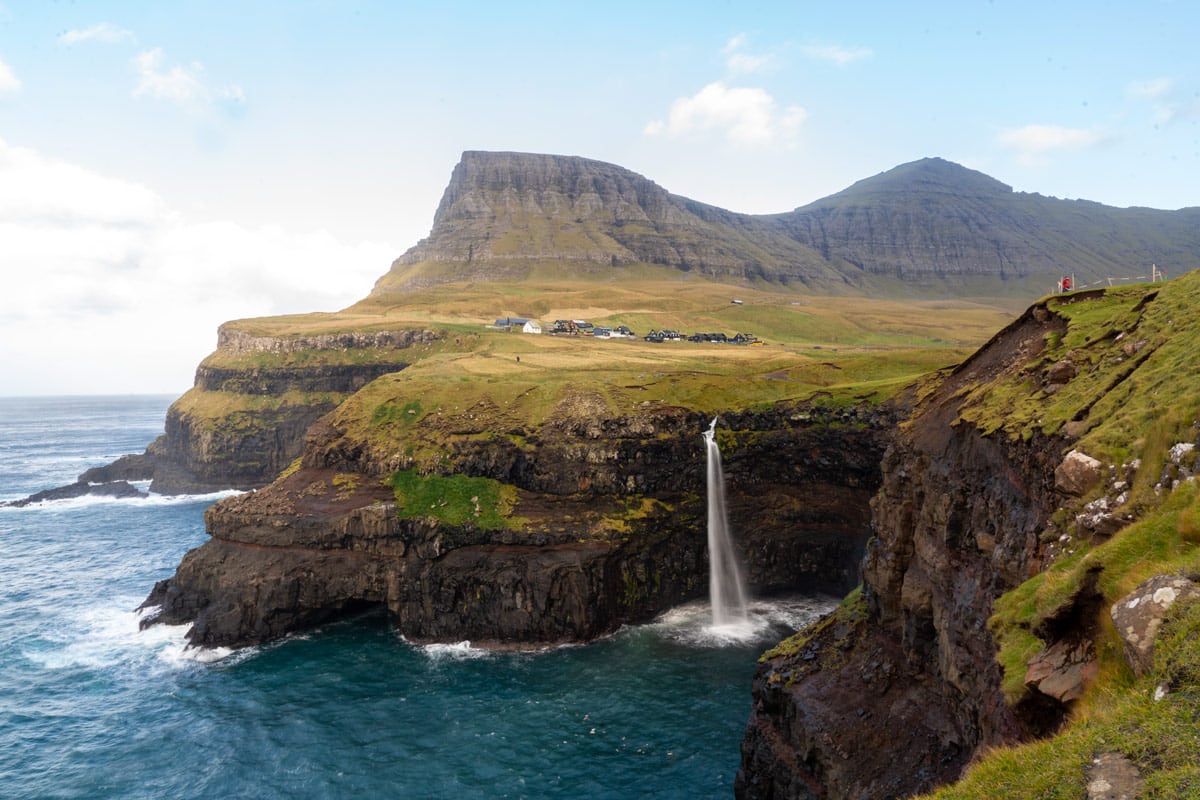 One of the Faroe Island's most famous sights is Múlafossur tumbling into the ocean