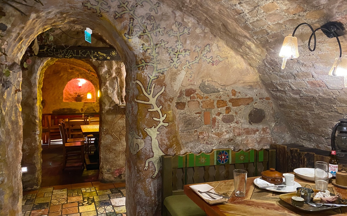 Snuggle away in an underground restaurant in Vilnius