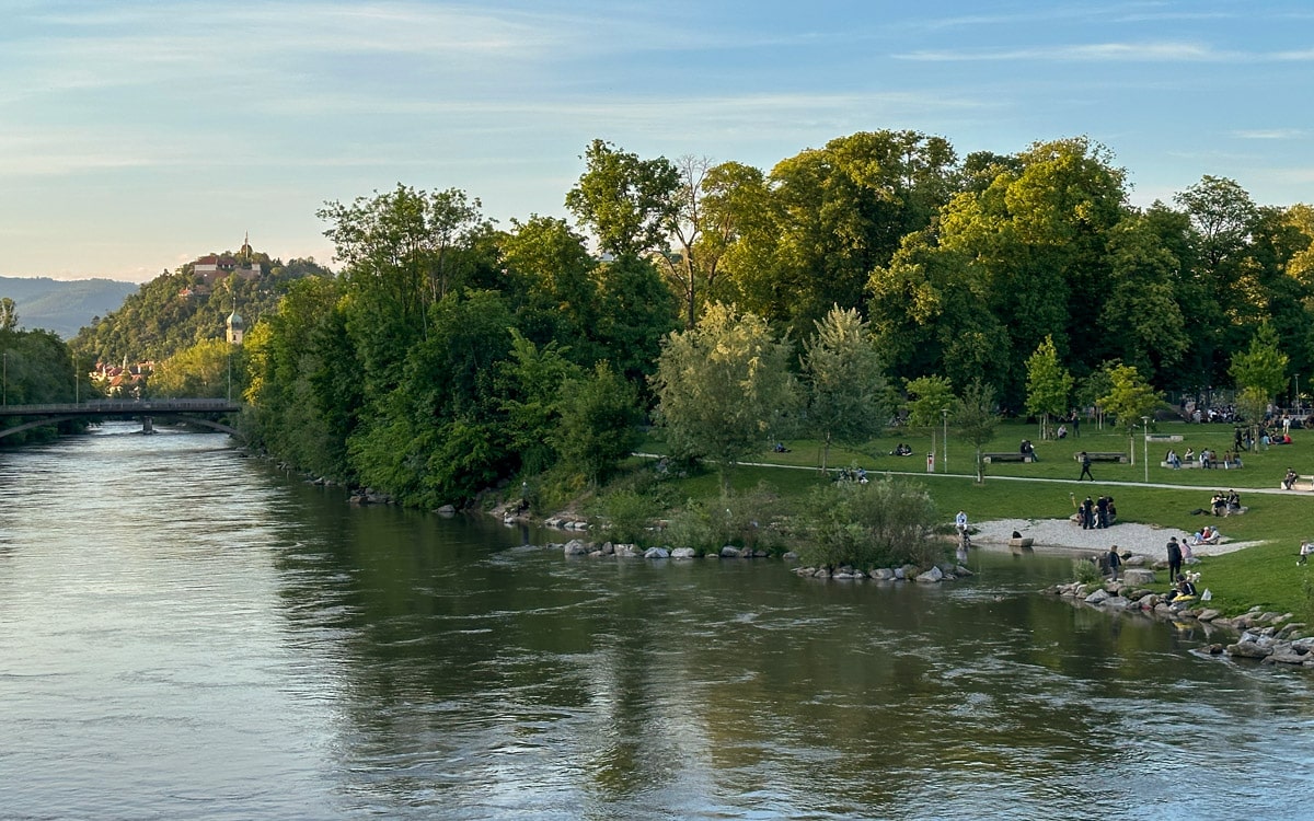 Graz's Augarten park with the Schlossberg in the distance