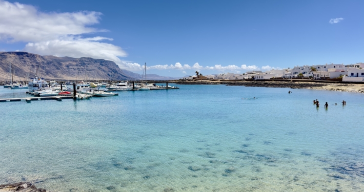 At Caleta de Sebo, on La Graciosa, swim with views of Lanzarote